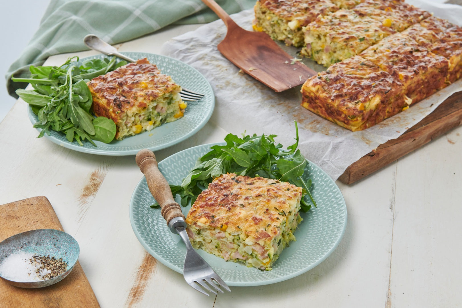 Zucchini slice served up on pretty plates