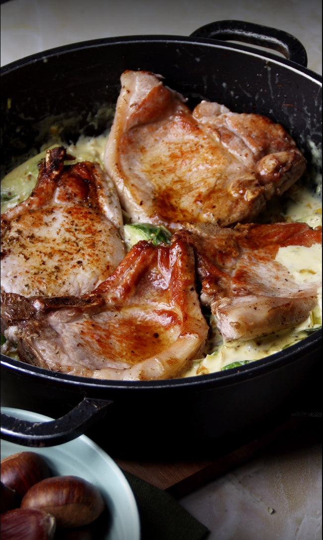 Cooked pork chops in a pan