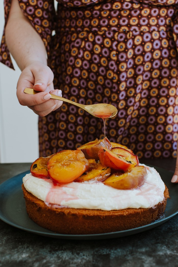 vanilla cake with ricotta icing roast peaches