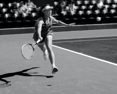 female athlete playing tennis