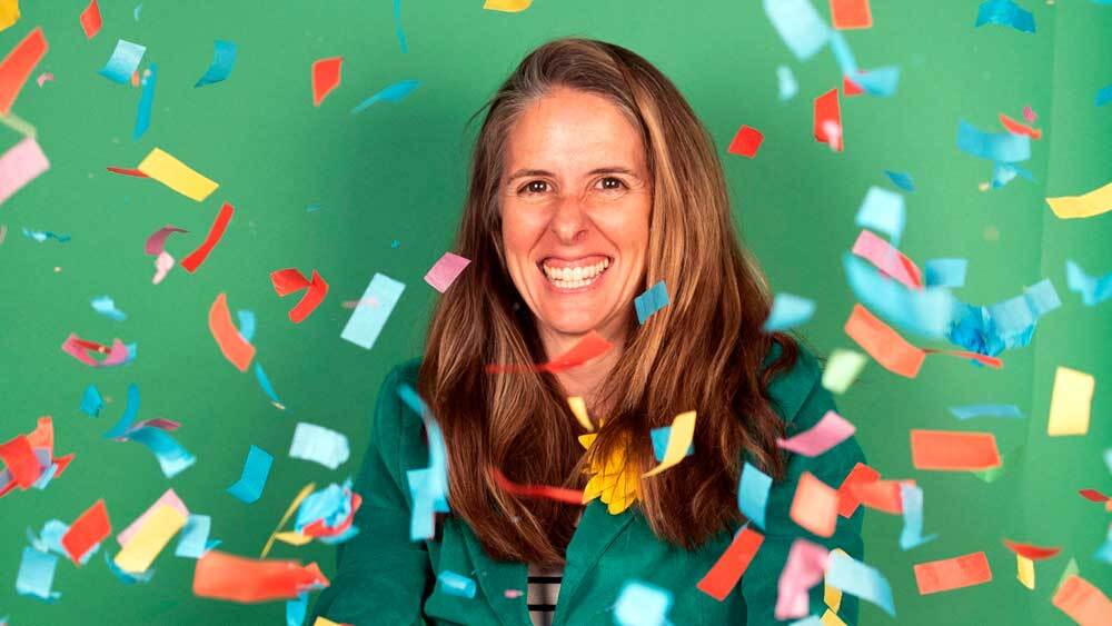 CEO Brooke English surrounded by confetti