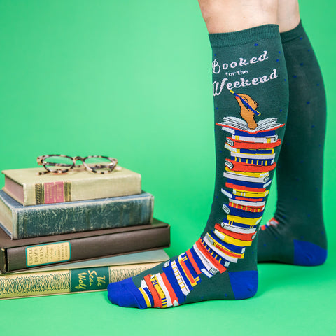 woman wearing cool book-themed knee socks
