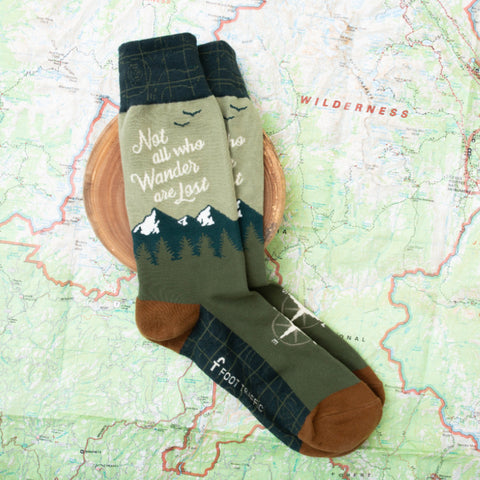 Fun men's socks that say, "not all who wander are lost"