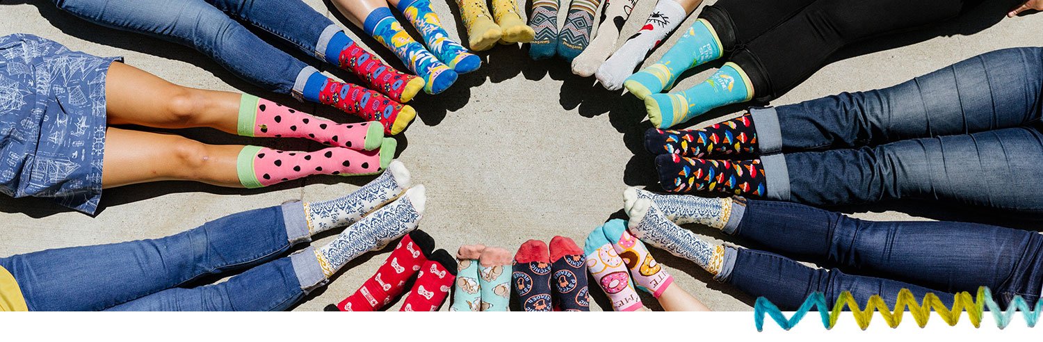 Feet with a variety of fun socks
