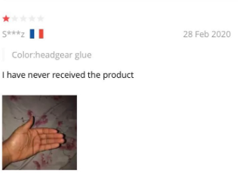 One star review that says "I have never received the product" with a picture of an empty hand.