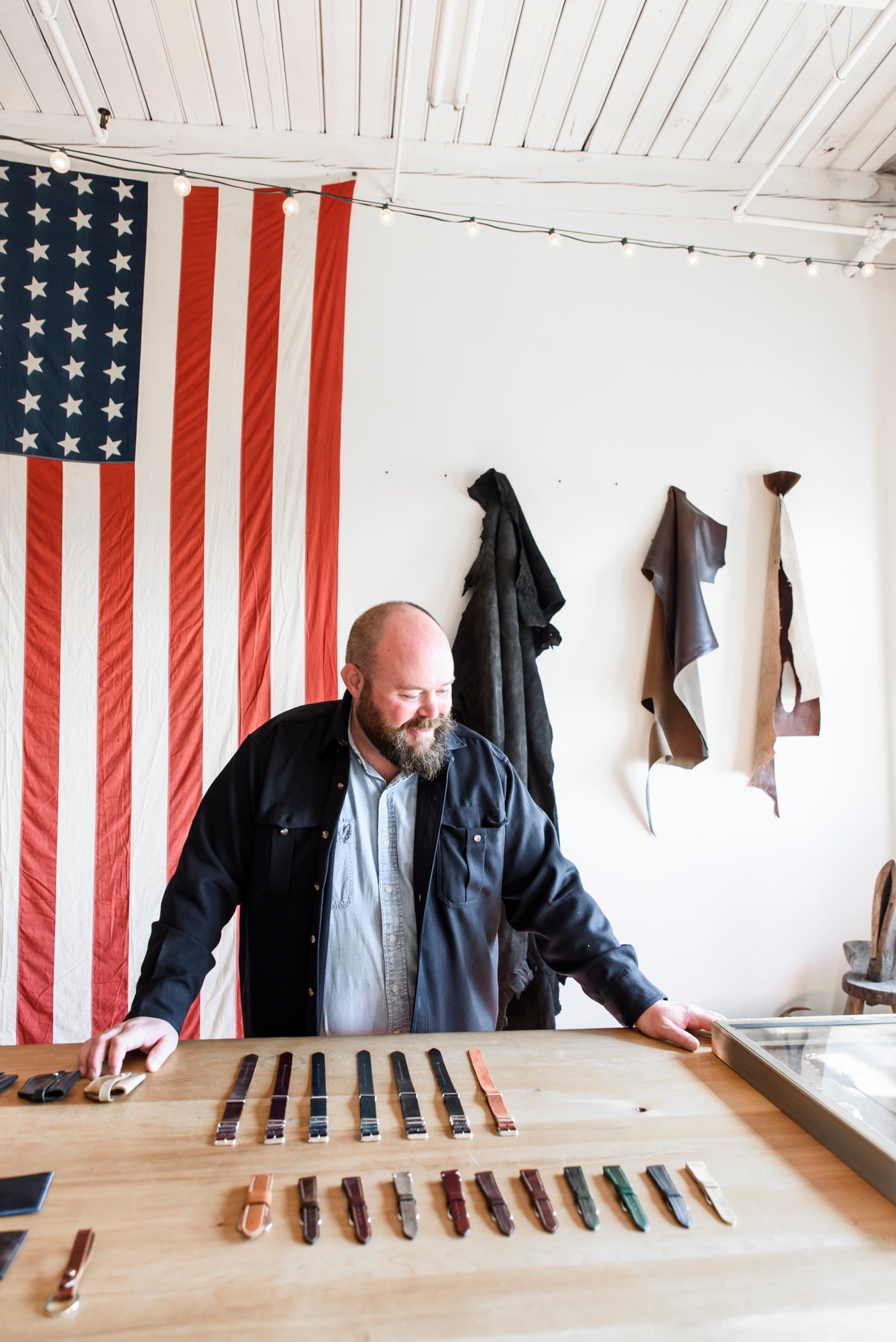 david lane in studio with assortment of work