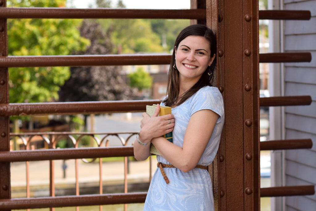 Rachael Holding Book