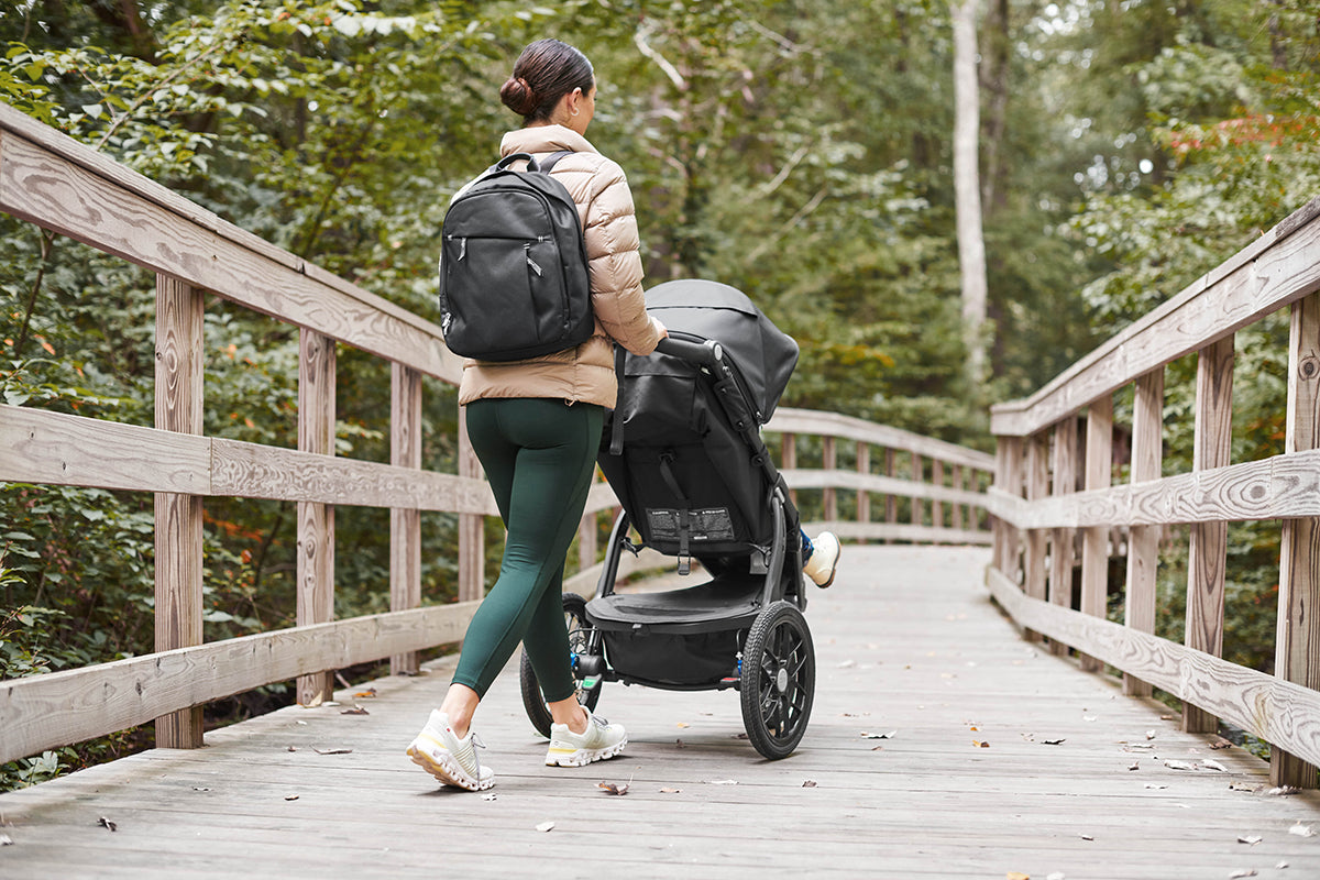 mom walking with jogger stroller