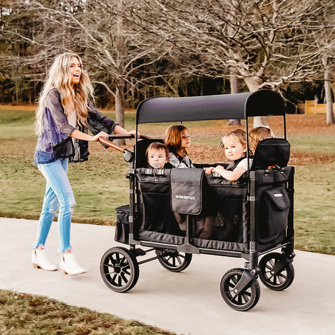 family with wonderfold wagon stroller luxe