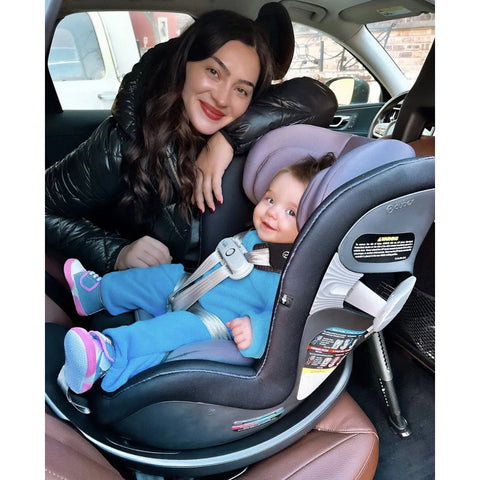 Happy Mother and Child with 360 Degree Car Seat