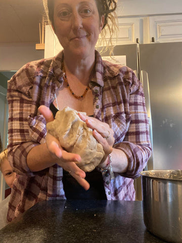 hippie farmer holding play dough