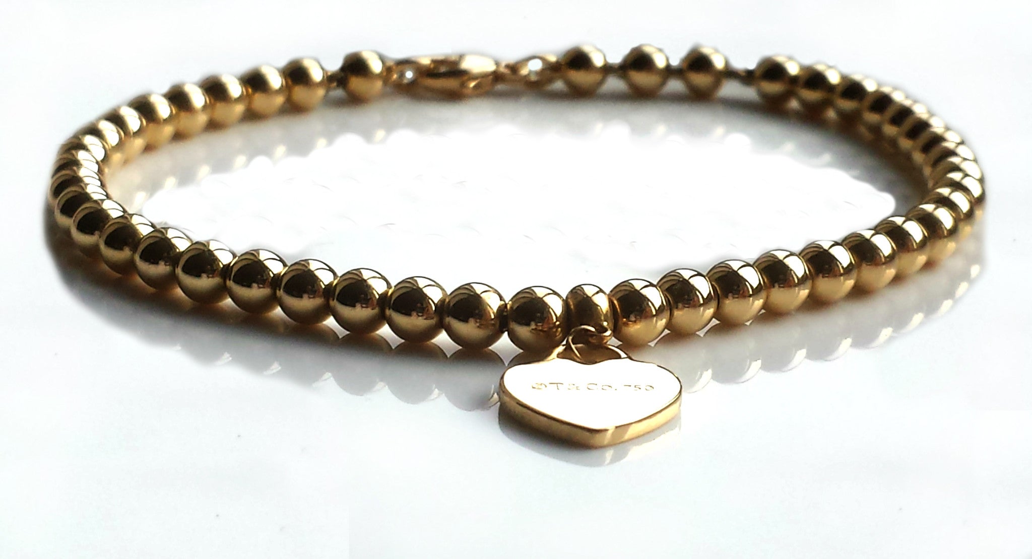 tiffany gold bead bracelet