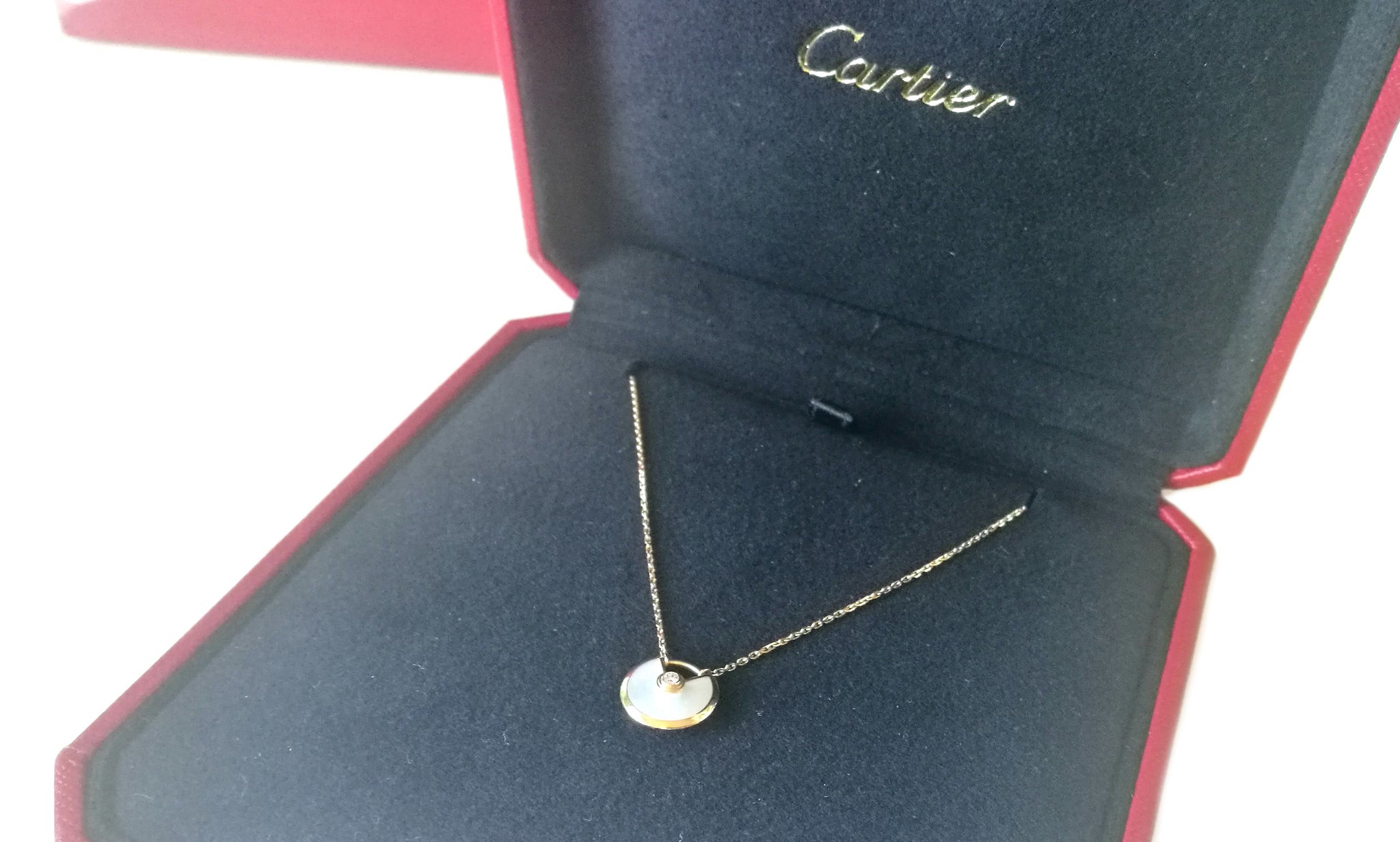 cartier amulette necklace long