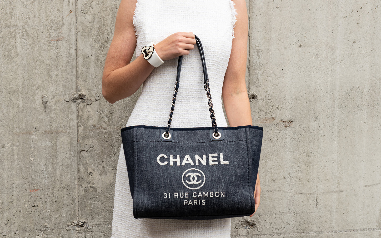 Denim everywhere trend for spring 2023 - authentic Chanel Deauville bag