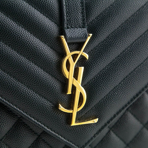 YSL handbag emblem on an authentic Saint Laurent bag