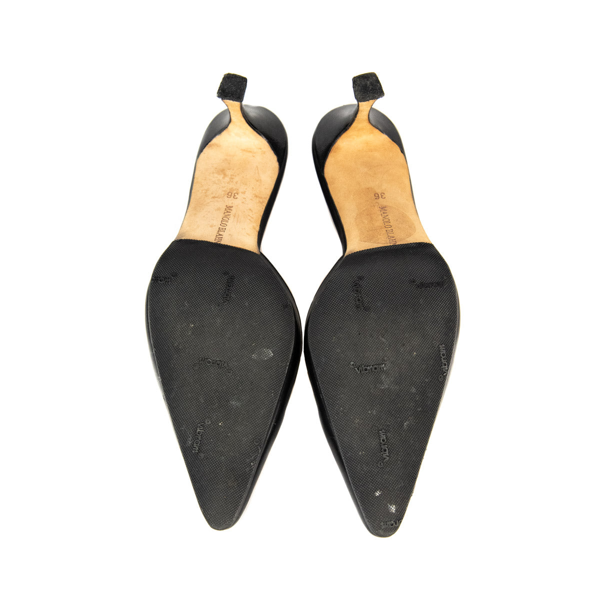 black leather pointed toe mules