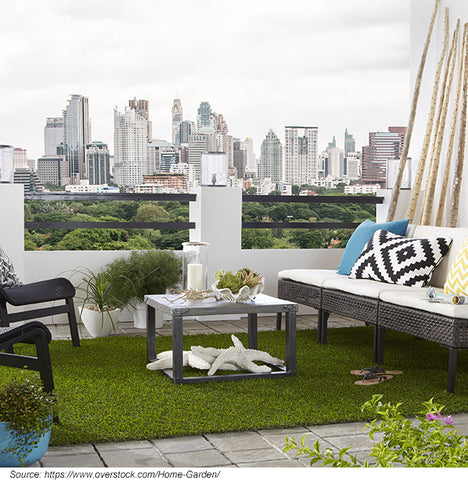 Artificial grass on a small balcony garden.