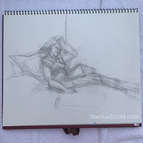 Pencil drawing of a woman reading by Toronto Artist Rachael Grad 