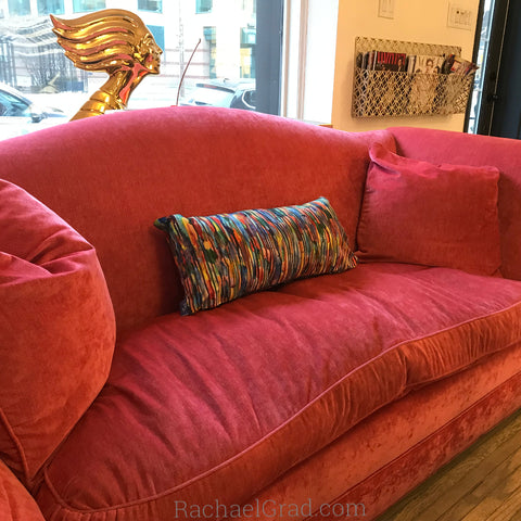 abstract multicolor pillow on pink couch by artist rachael grad yorkville toronto