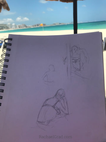 Drawings on the Beach in Mexico Man reading pencil woman