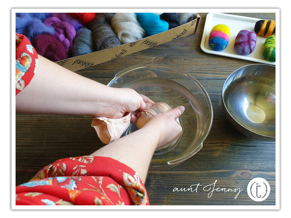 Dunking the soap in the hot water bowl