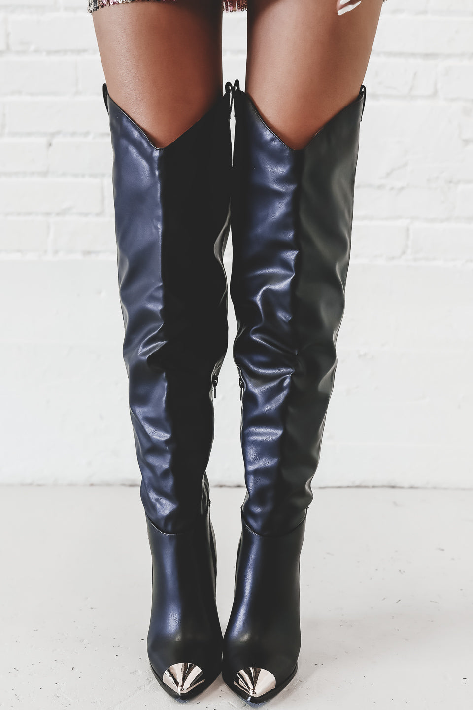 black over the knee cowboy boots