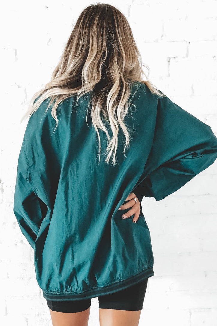 nike windbreaker turquoise