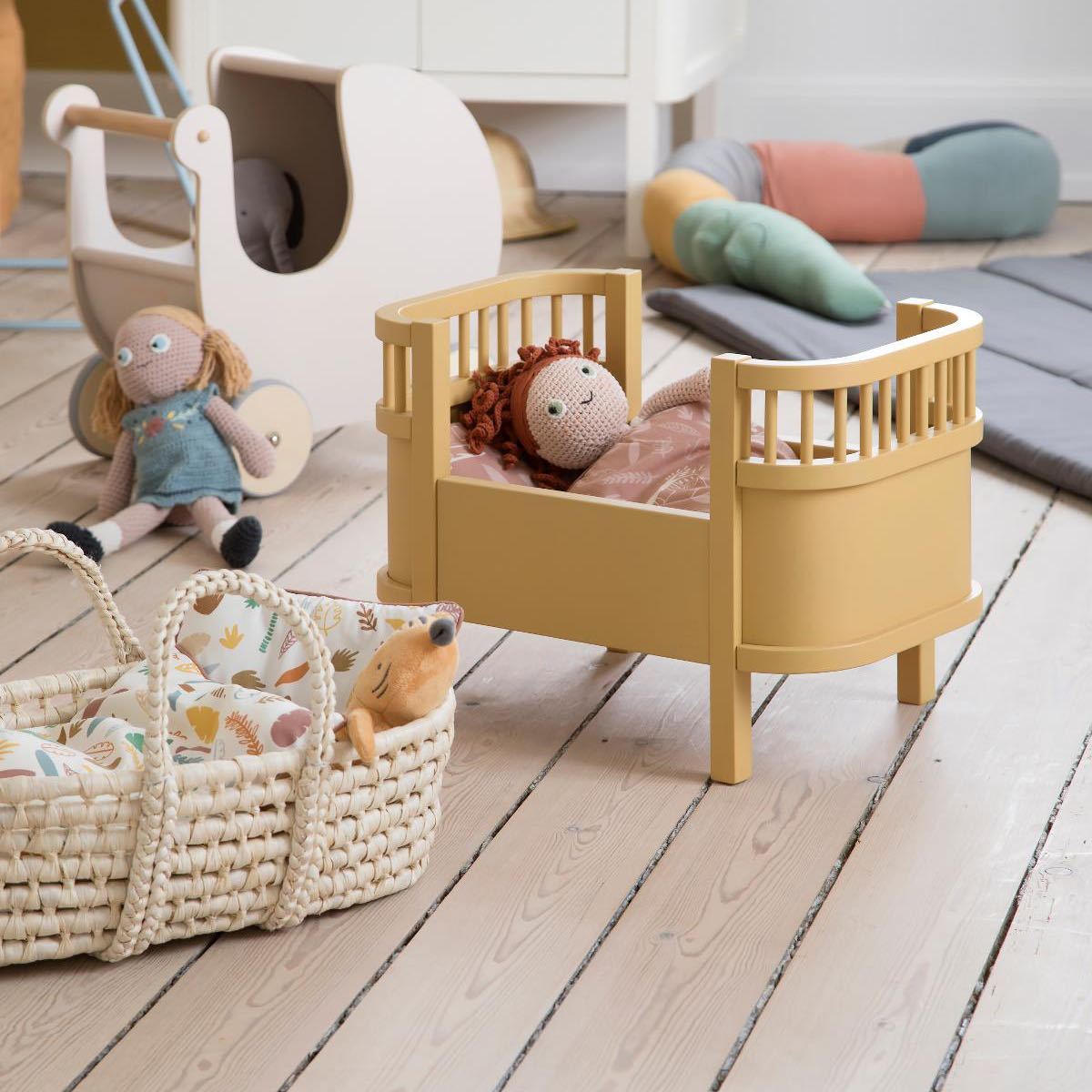 pink wooden dolls pram