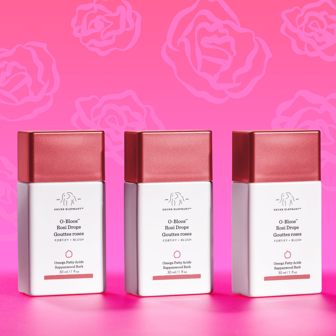 multiple bottles of O-Bloos standing against a pink background