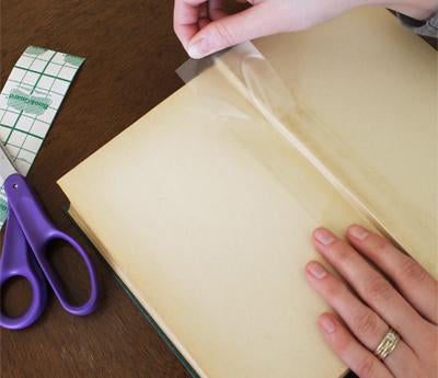 vinyl tape repairing a book