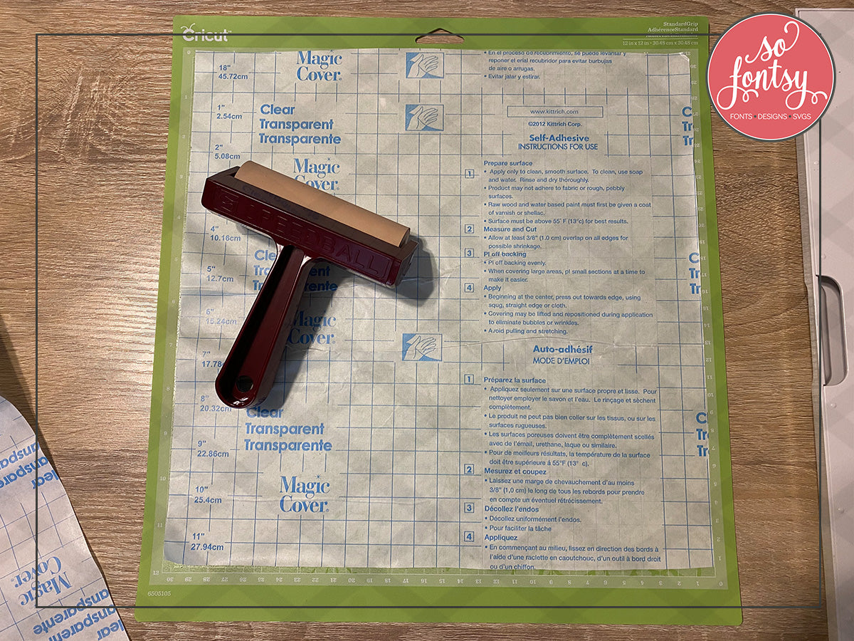 Use a brayer to place materials on your Cricut mat