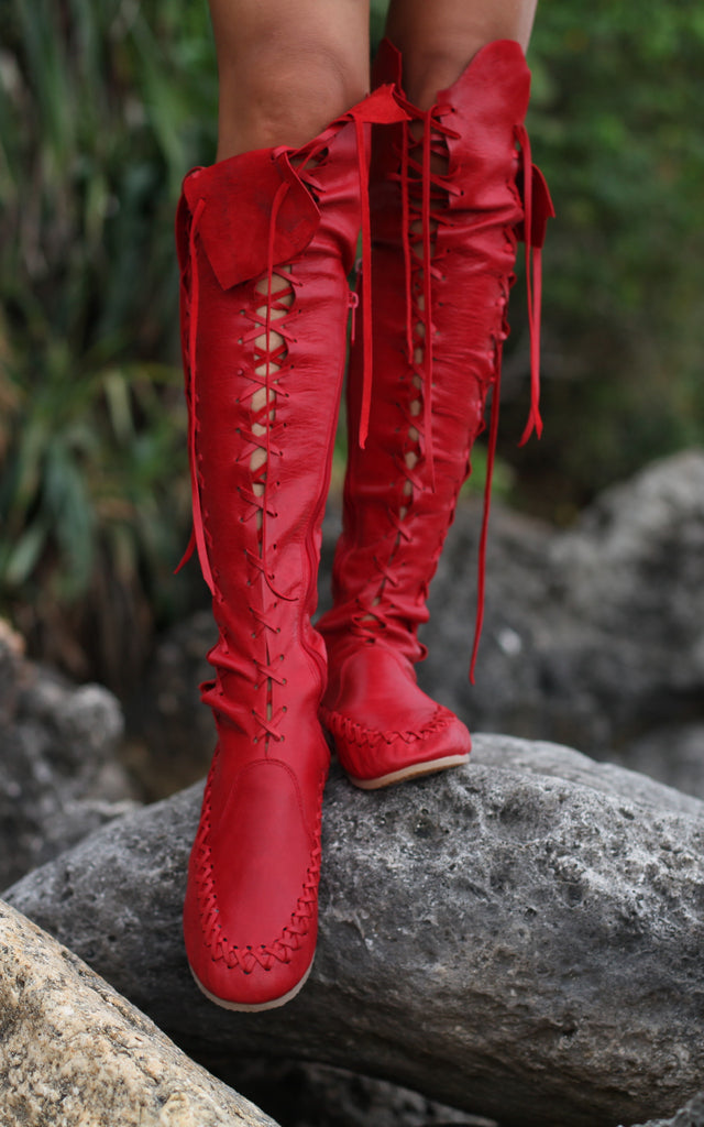 red leather knee high boots