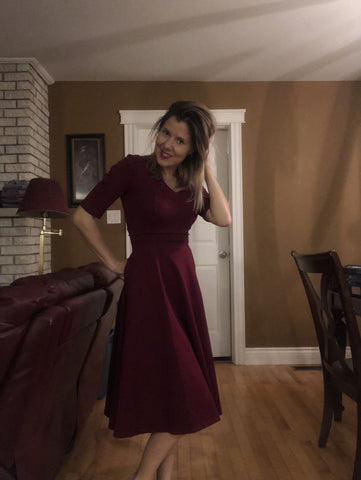 Woman posing in V Neck Gala Dress