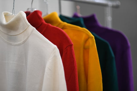 Colored shirts hanging up