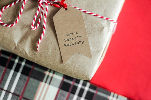 Wrapped package with a made in Santa's workshop tag