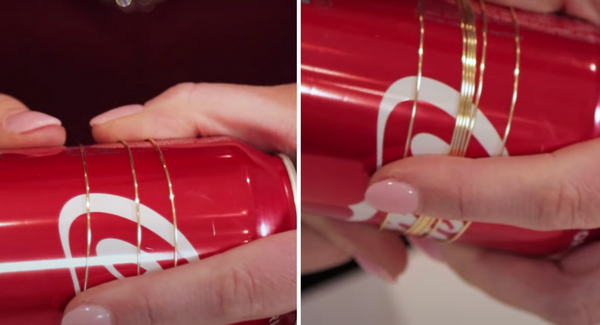 showing wire wrapped around a can to create a bangle bracelet