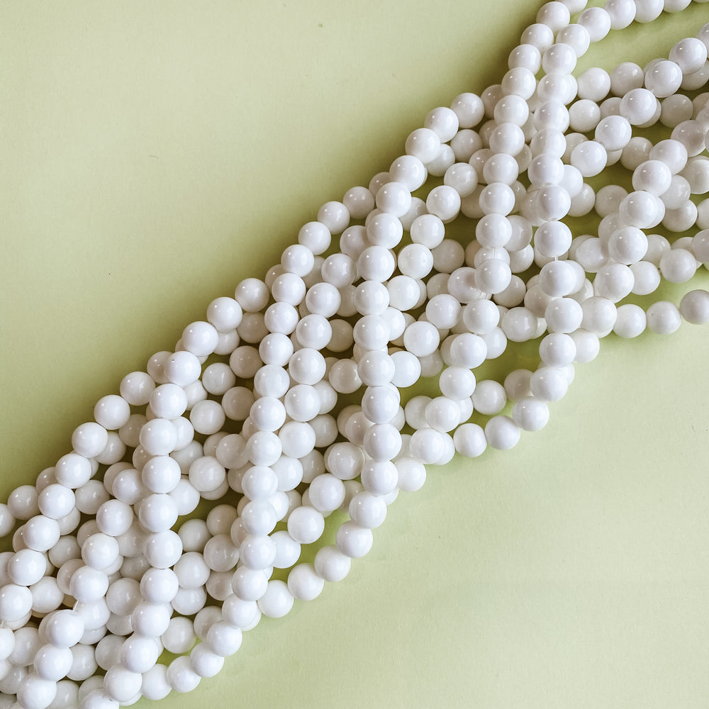 
                
                    Load image into Gallery viewer, 8mm White Mother Of Pearl Round Strand
                
            