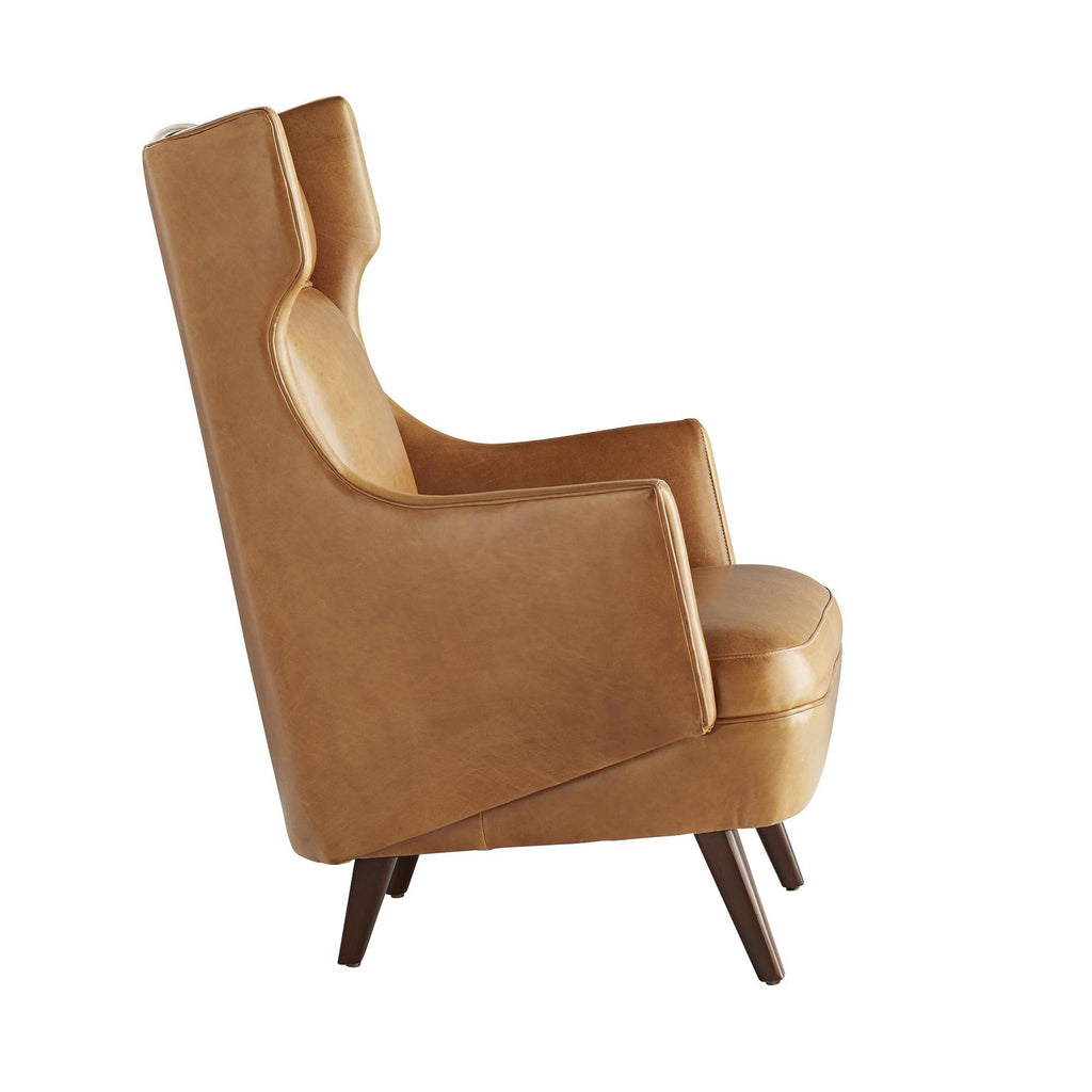 modern wing chair in cognac leather