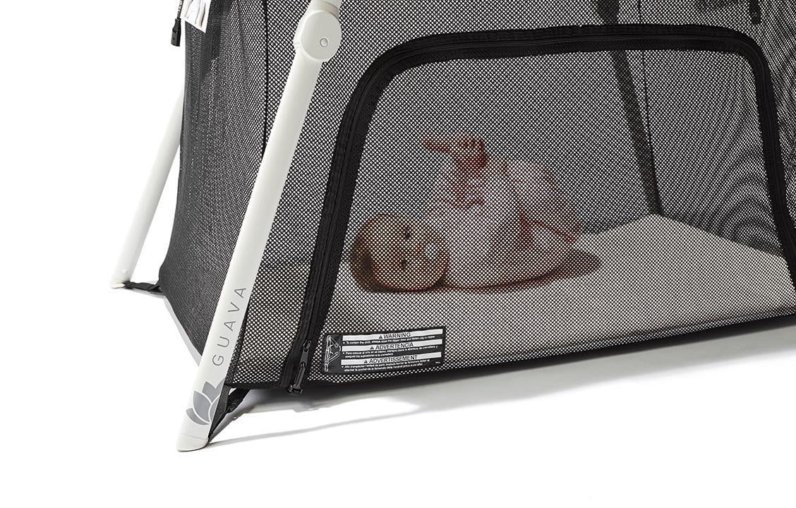 lotus everywhere travel crib in store