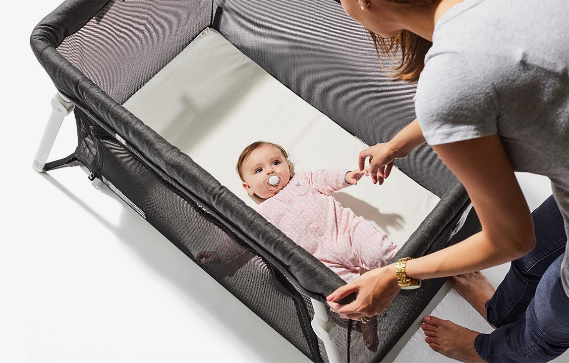 lotus travel crib and portable baby playard