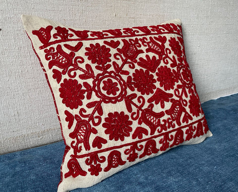 red embroidered cushion from transylvanian irasos style embroidery  vintage folk textile