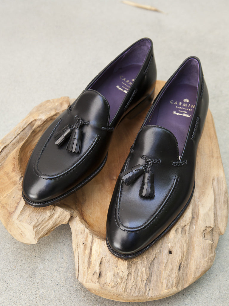 black loafers with tassels