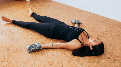 Hand Weights in Savasana to help relieve carpal tunnel pain