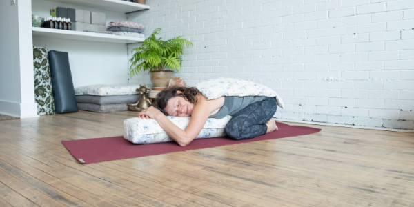 Rest with a yoga bolster