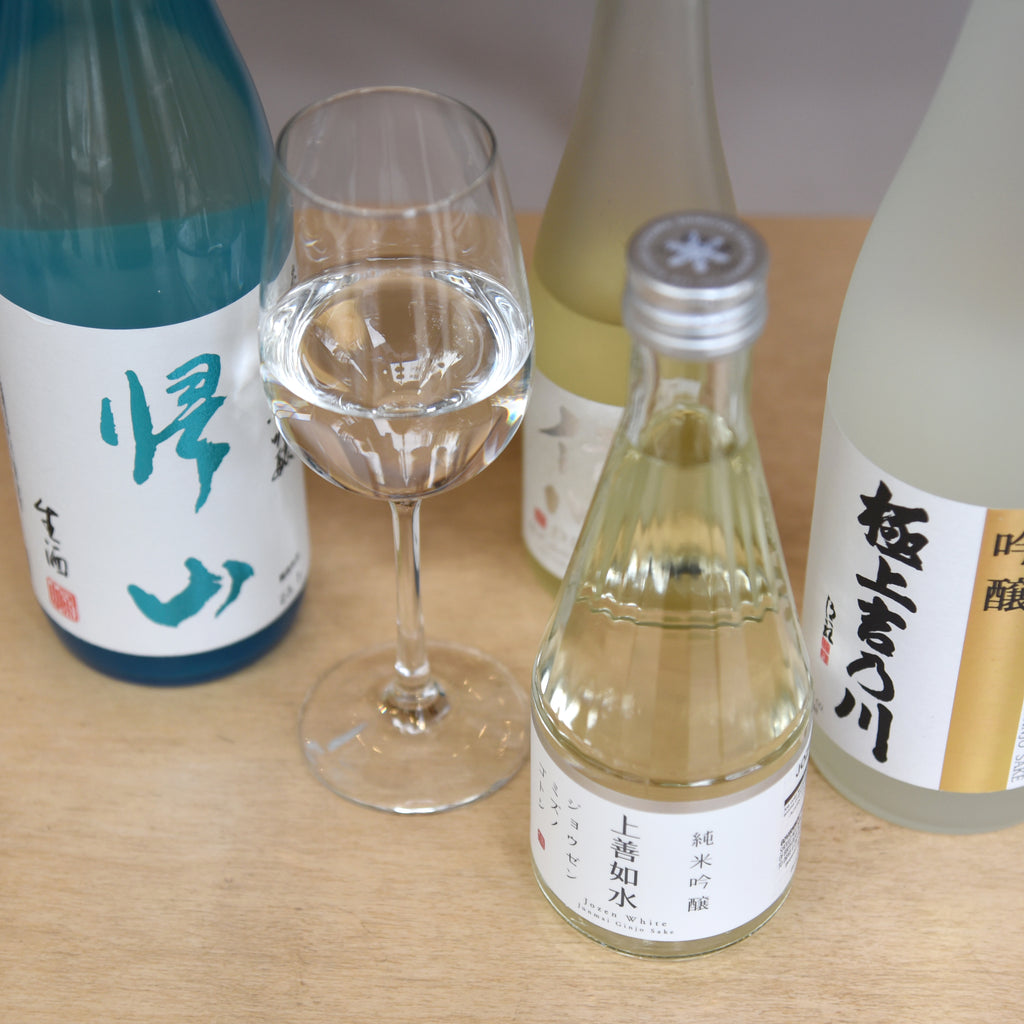 Four sake bottles under the theme Yukidoke (snow melt)