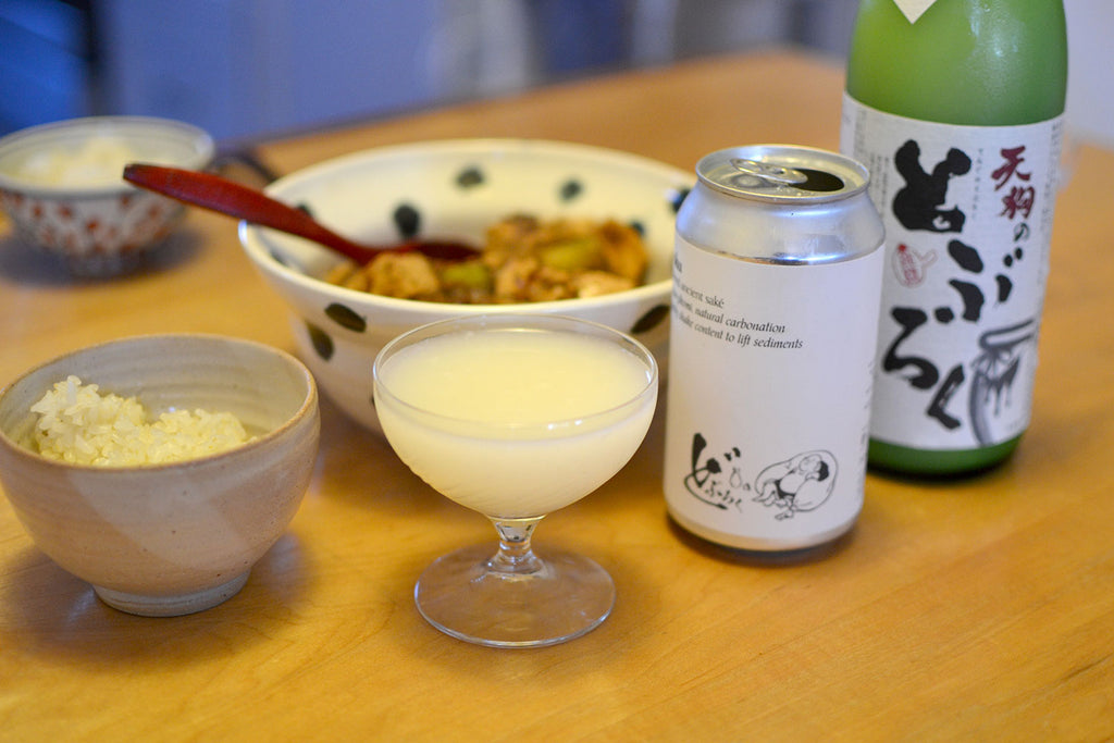 Doburoku sake with a bowl of rice and mapo tofu.