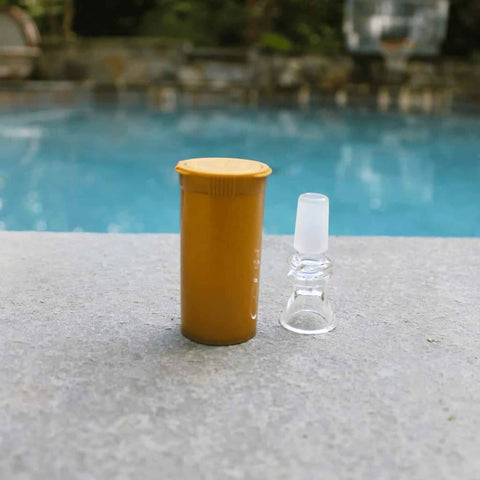 glass bowl next to a pool