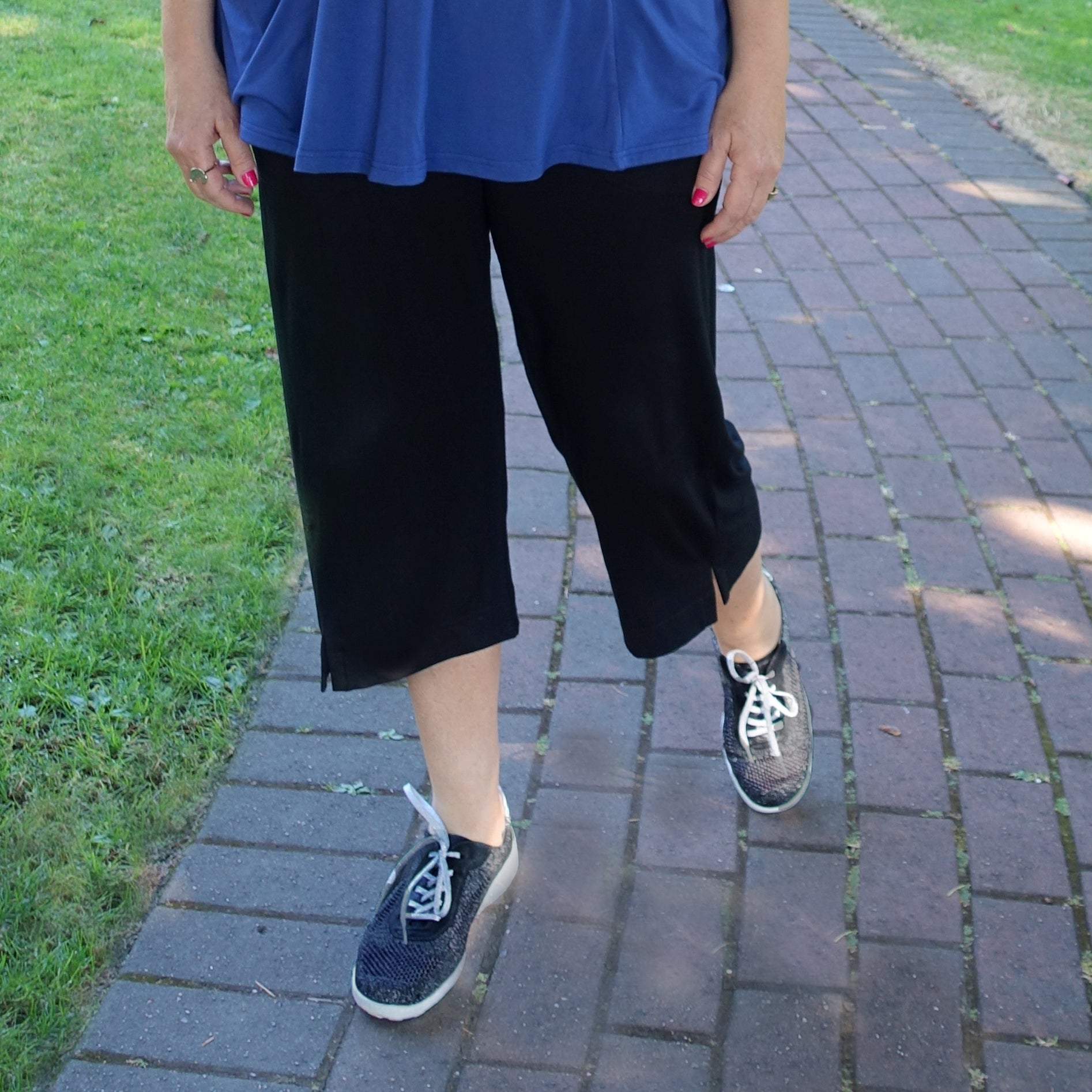 Plus size model wears the Black Escape crop pant by Canadian designer Diane Kennedy