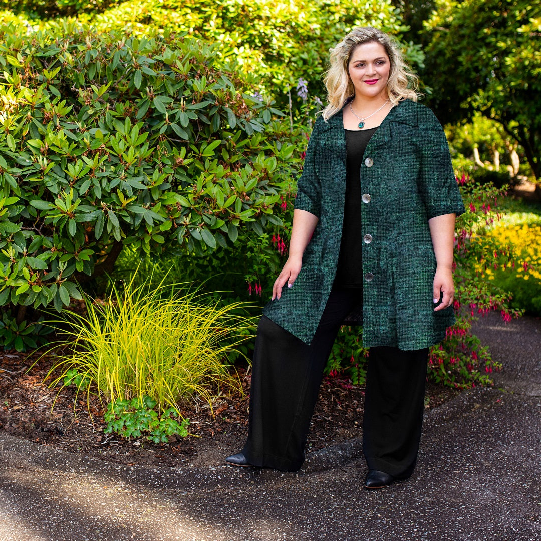 Diane Kennedy's Rhapsody coat styled over all black tunic and pants