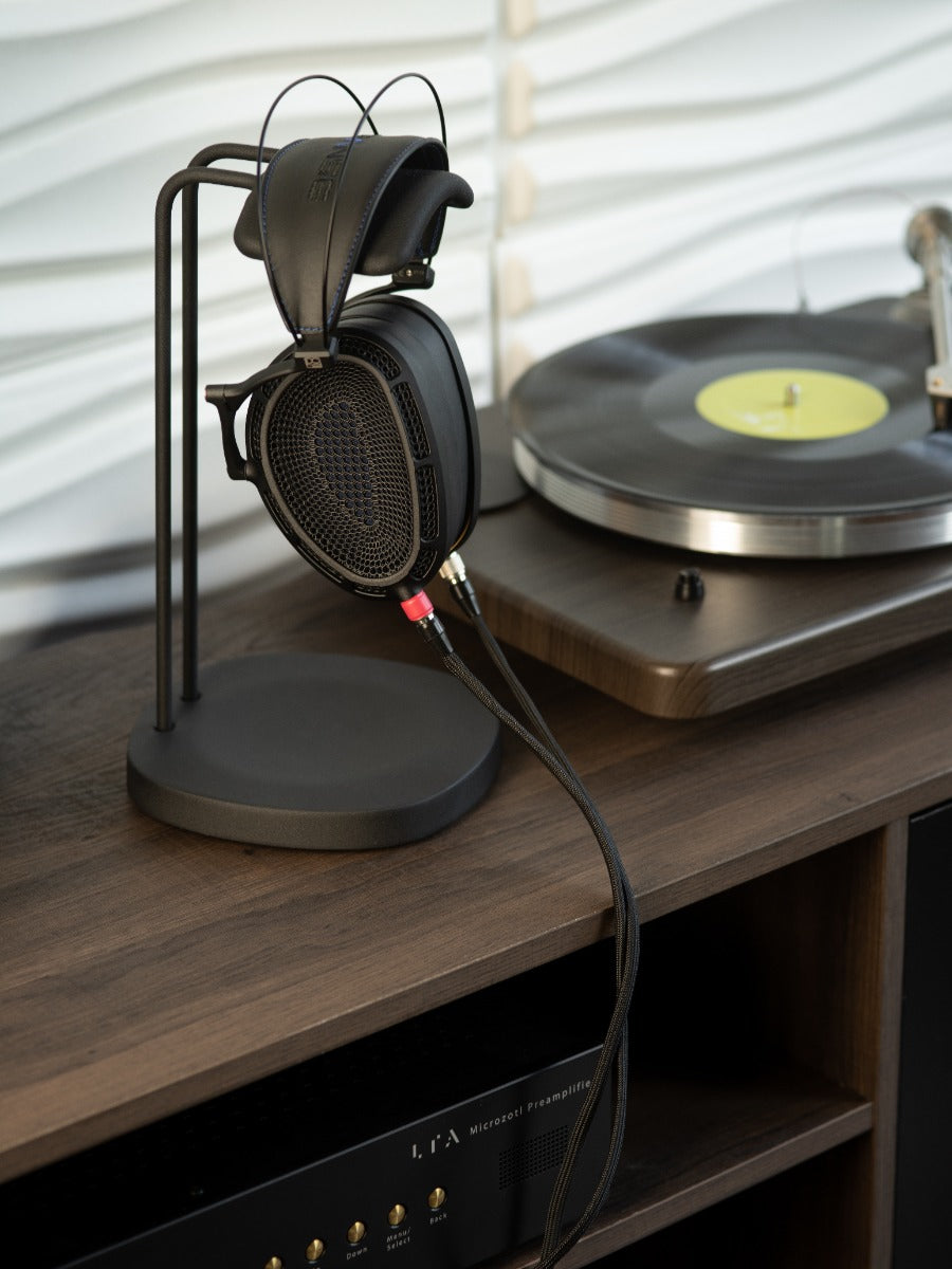 DCA expanse headphone next to turntable